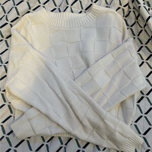 Checkered white cropped sweater